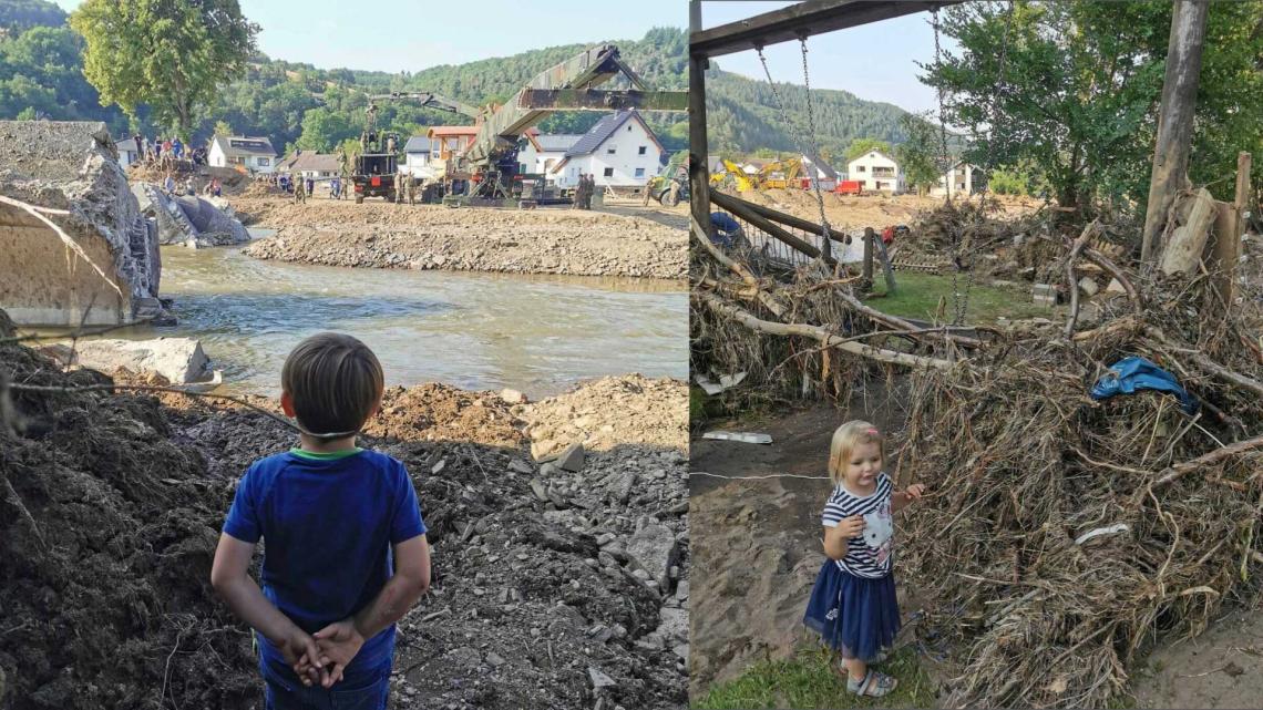 children look at the destruction after the flood